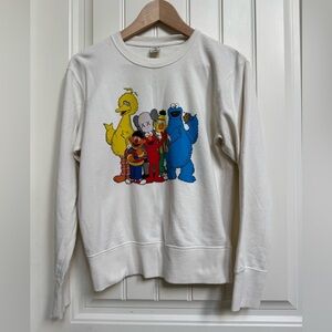 Uniqlo x Kaws Sesame Street Unisex Cream Crewneck Sweatshirt. Size XS